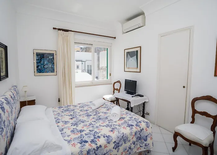 Апартаменты Casa Santa Teresa By Caprirooms *